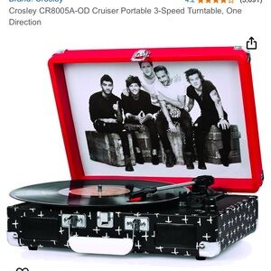 Crosley Black Portable Record Player with Suitcase Design and Retro Aesthetics